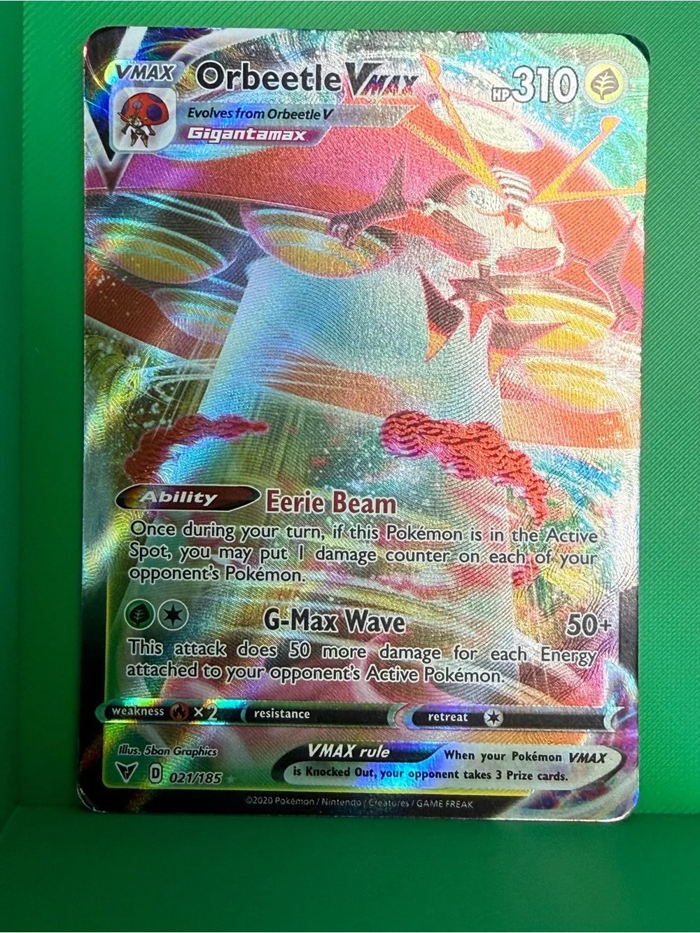 Orbeetle VMAX Rainbow Holo Pokémon Card - Pink & Gold Accents 021/185